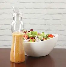 G.E.T - 32 oz Clear Polycarbonate Salad Dressing Bottle (12 Per Case) - SDB-32-PC-B-CL